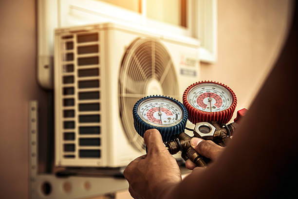 Professional Air Conditioning Service technician working in Lawrence, PA